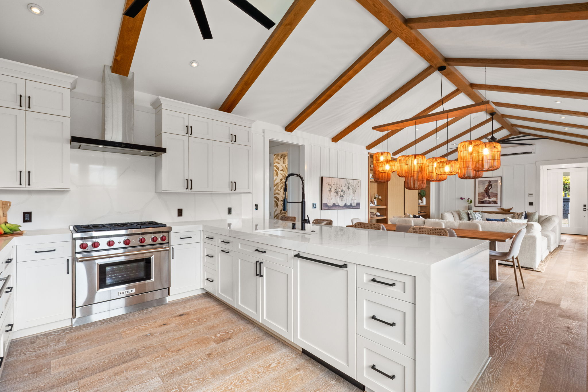 Chef's kitchen open to great room with Wolf range and stone countertops