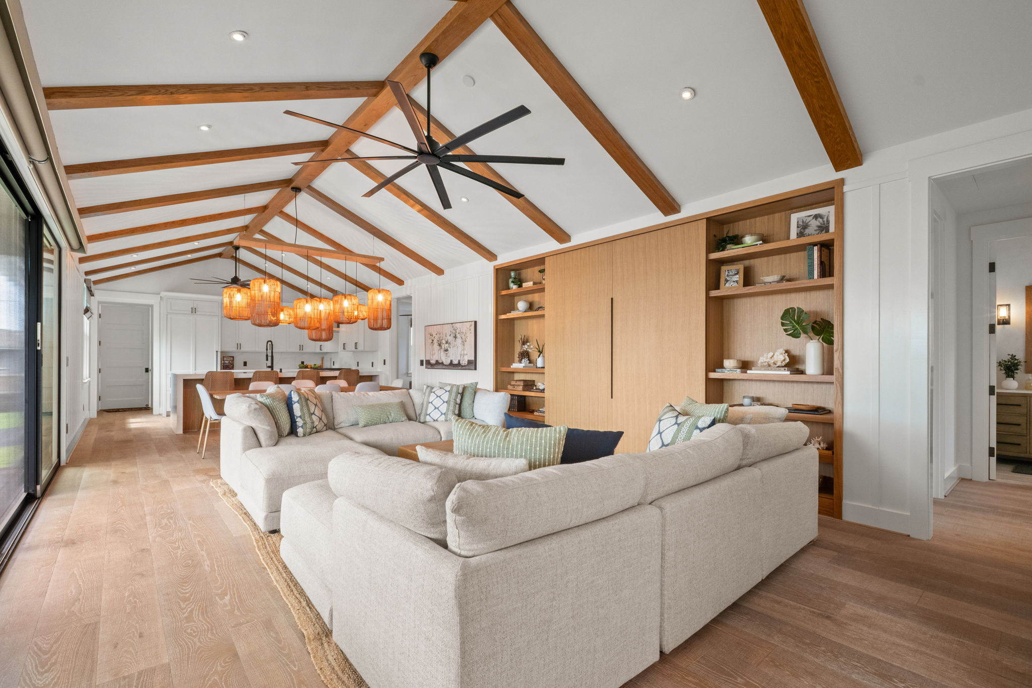 Great room with soaring vaulted ceilings and exposed wood beams