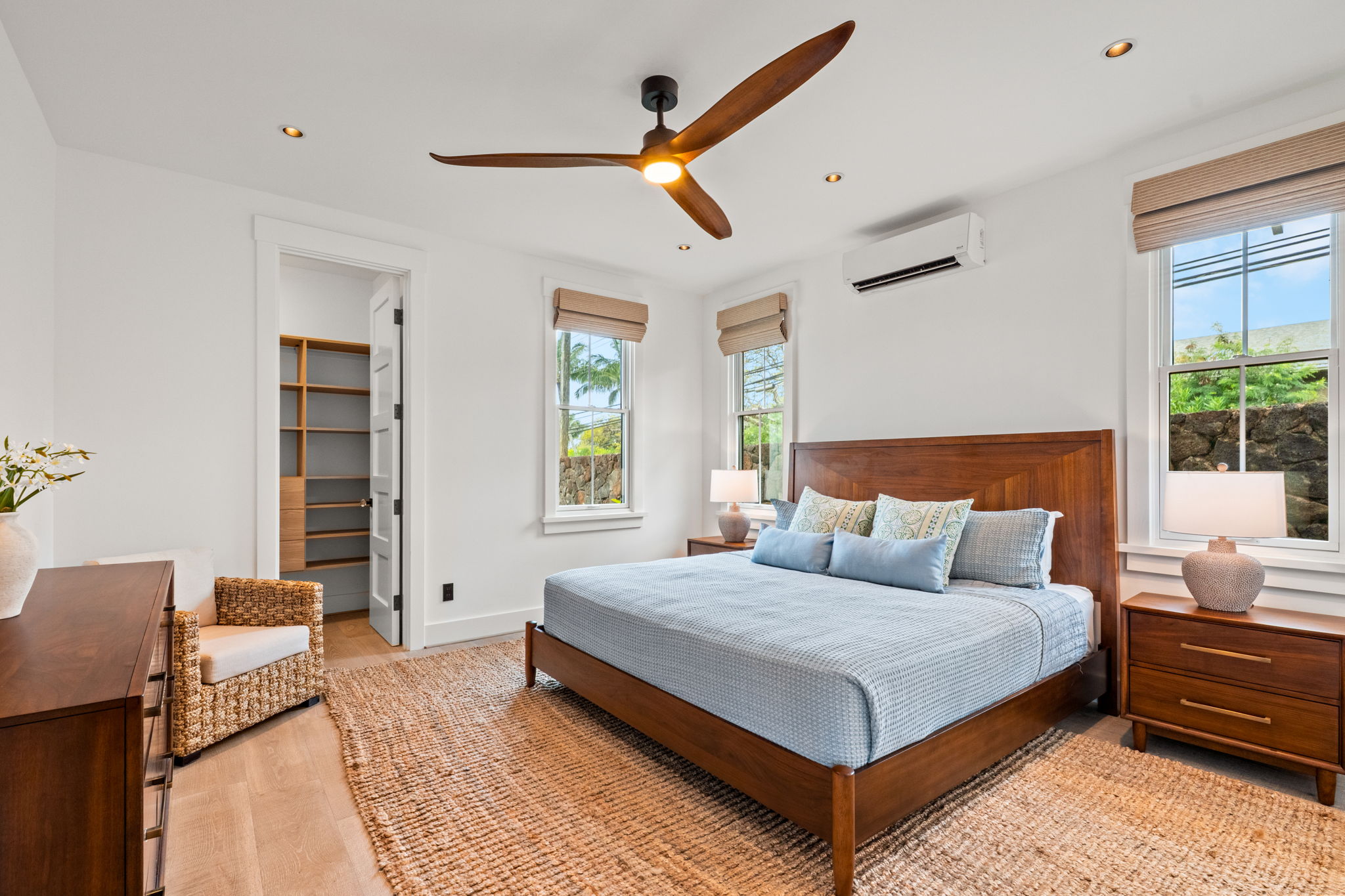 Primary bedroom with walk-in closet