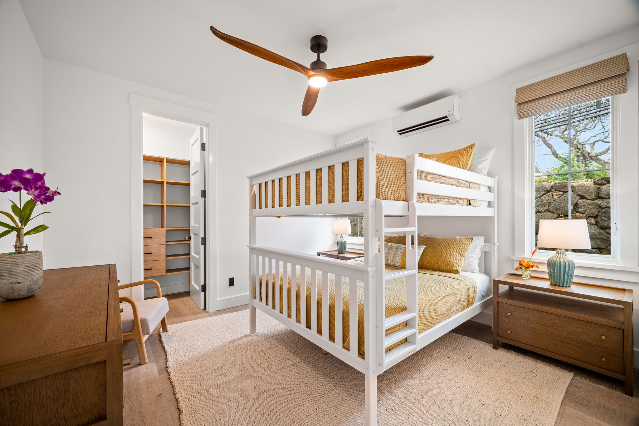 Bunk bedroom with walk-in closet