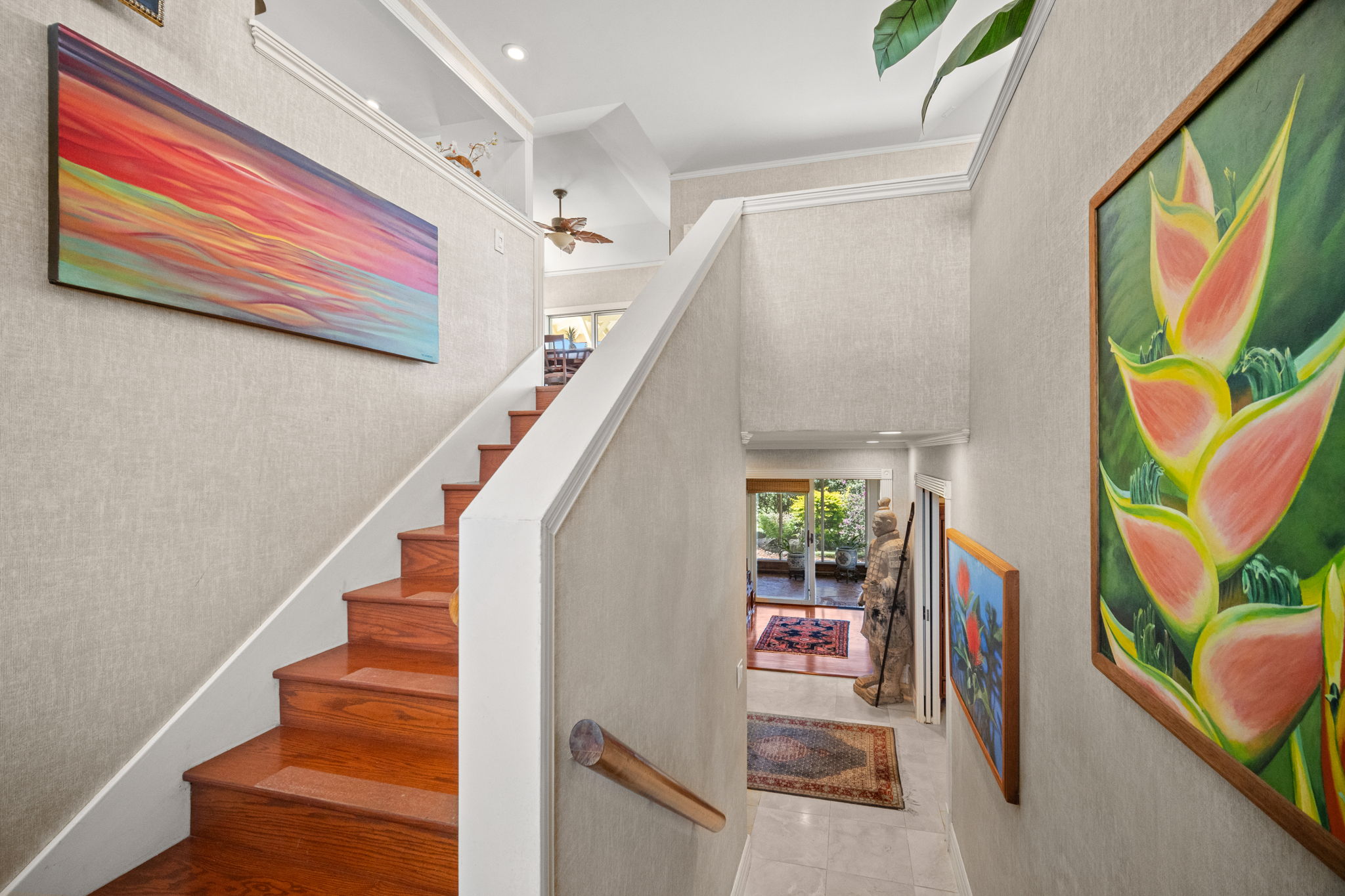 Grand staircase with art gallery wall