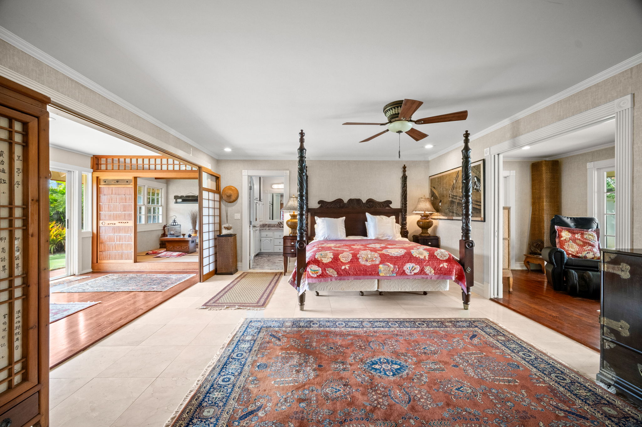 Primary suite with four-poster bed