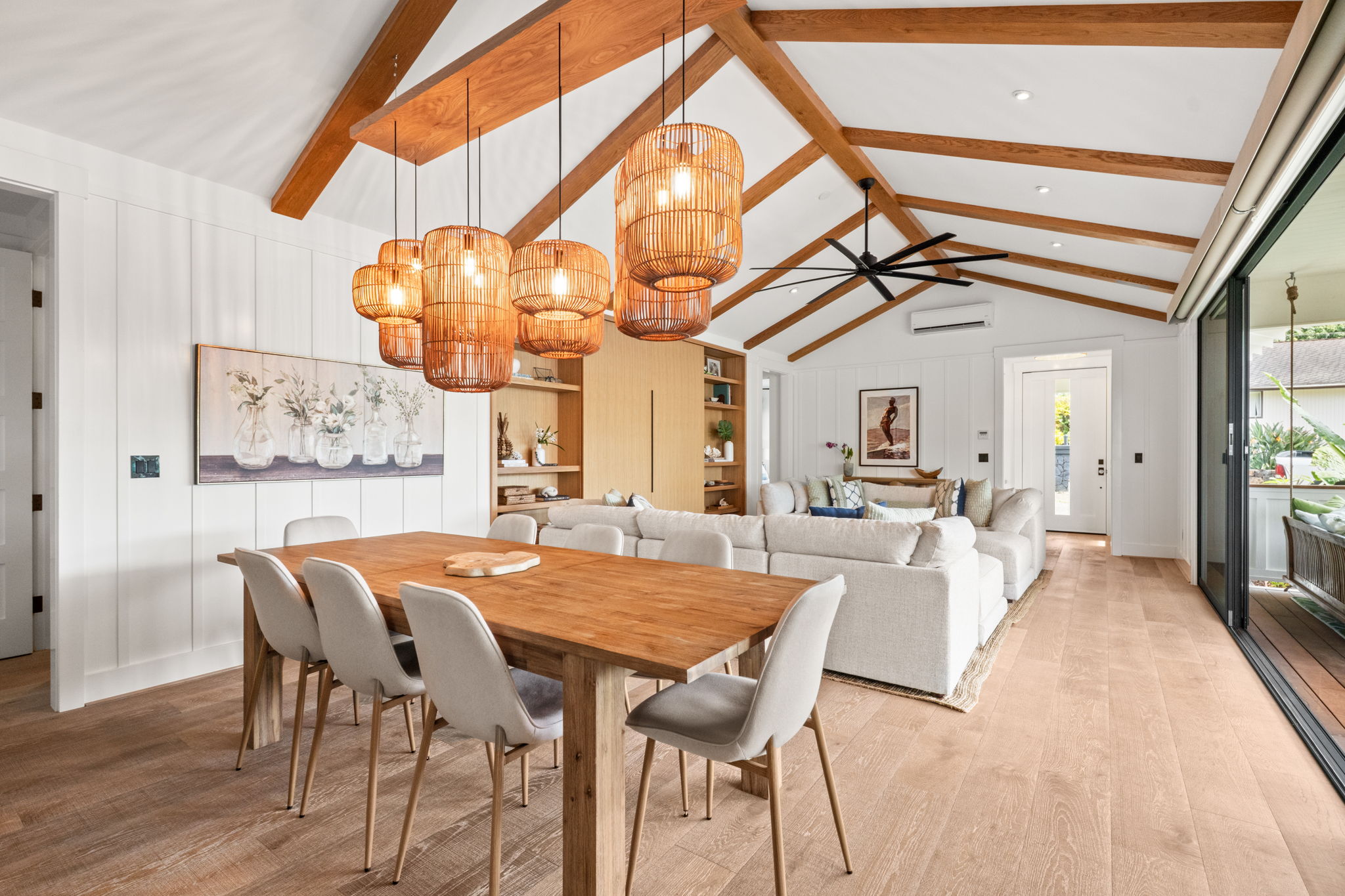 Dining area with rattan pendants and vaulted ceilings