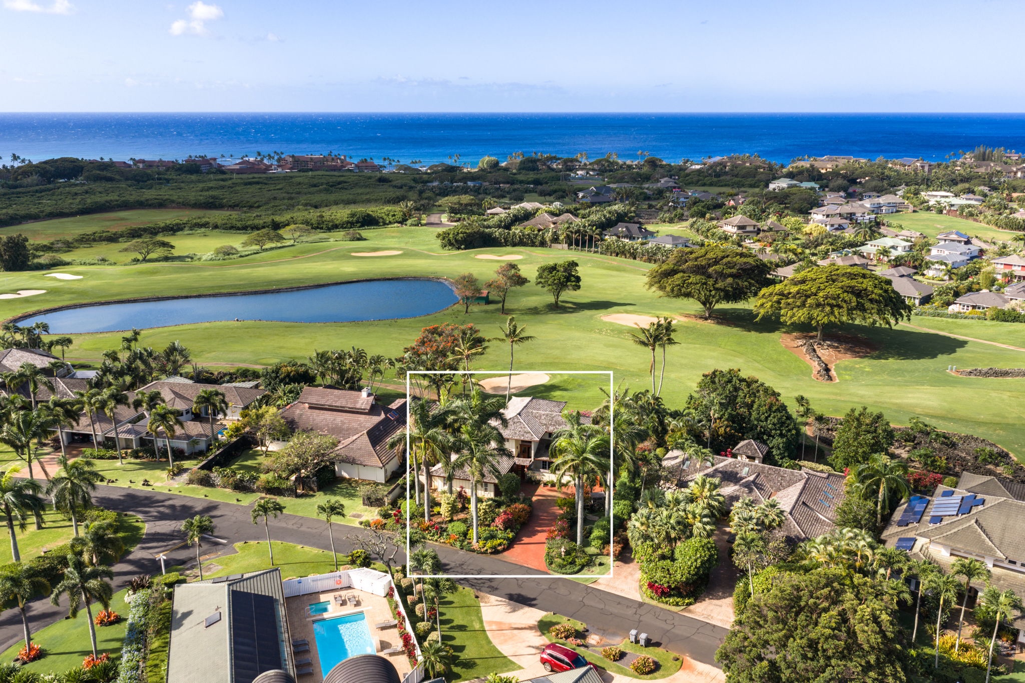 Aerial drone view highlighting the property within Kiahuna Golf Village