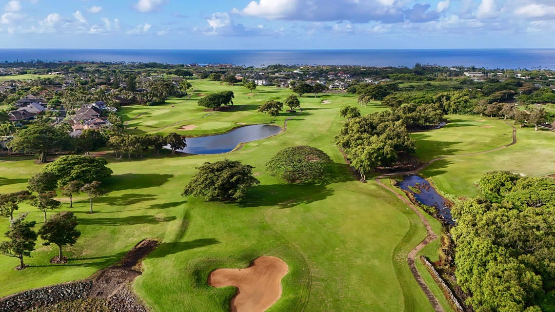 Fairway at Kiahuna Golf Club with homes beyond the greenbelt, Poipu, Kauai